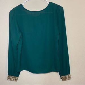 Jeweled chiffon top.